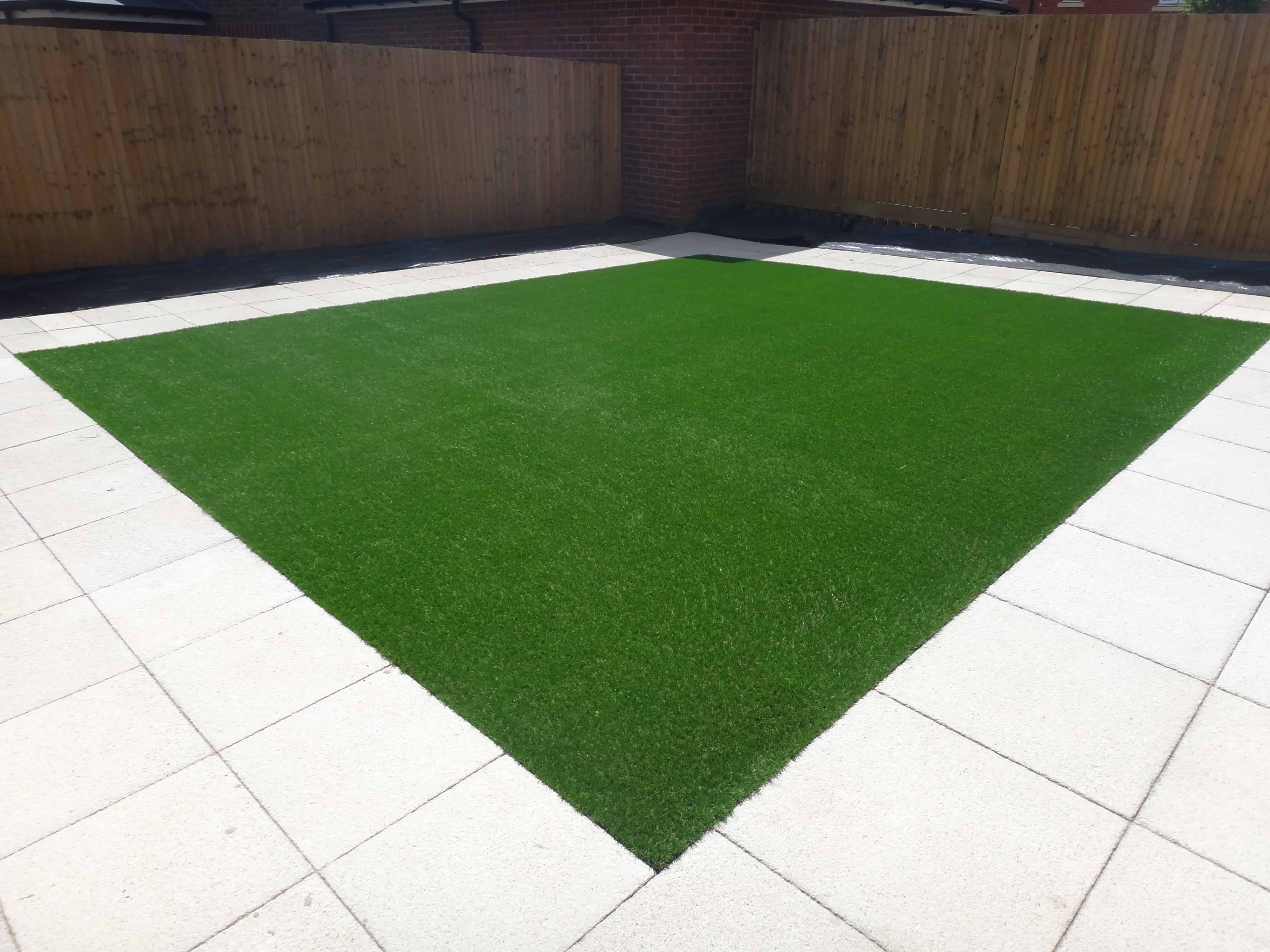 Square of Artificial Grass installed by Acre Driveways